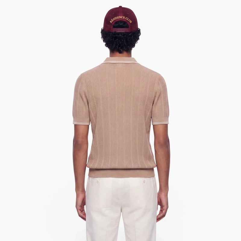 Résidence Club Prince of Paris Burgundy Cap – Rückansicht am Model